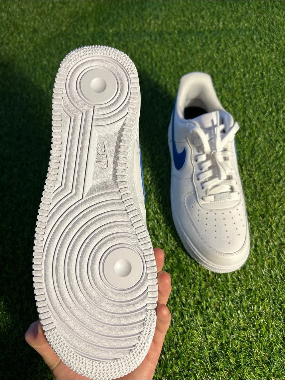 Nike White Leather Sneakers with Blue Swoosh